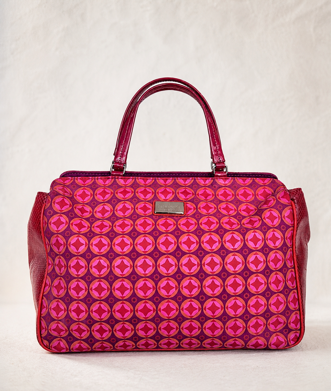 CARTERA DE CUERO ESTAMPADA + CIRCULOS RETRO JACKIE SMITH