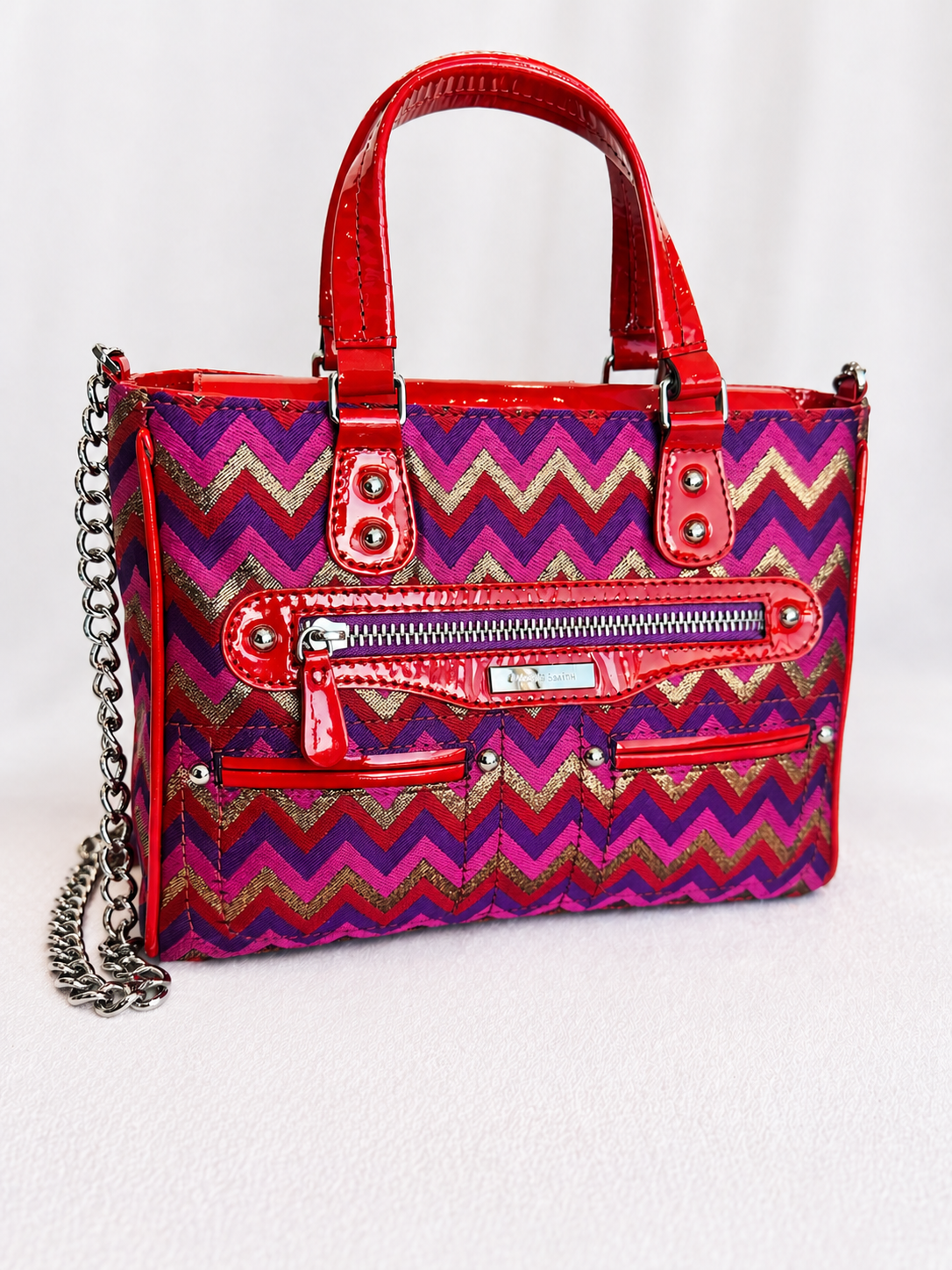 CARTERA DE CUERO REVESTIDA EN TELA ROJA JACKIE SMITH