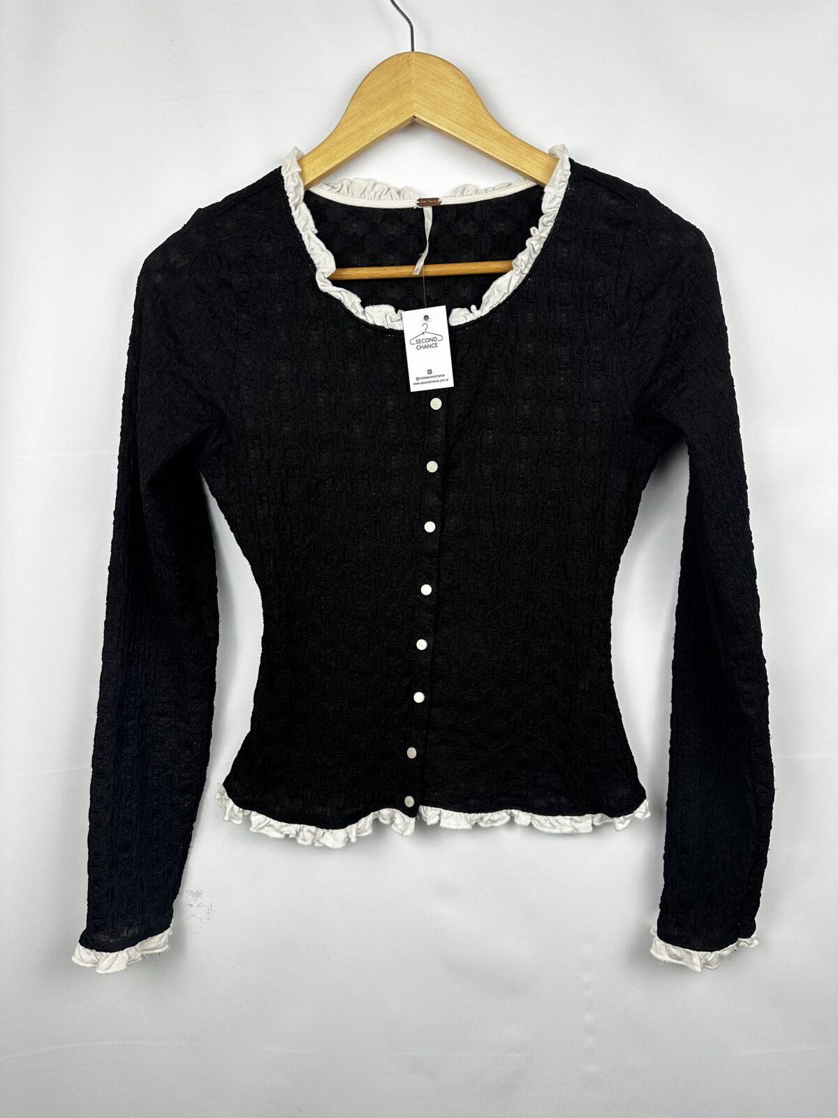 CAMISITA NEGRA TRANSPARENTE + VOLADITOS FREE PEOPLE (S)